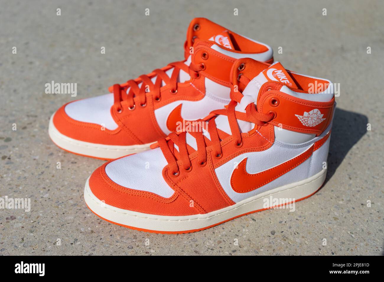 BLOTZHEIM, FRANCE - 04 MARCH 2023 : Nike Jordan 1 Retro AJKO rush orange,  white-sail sneakers Stock Photo - Alamy