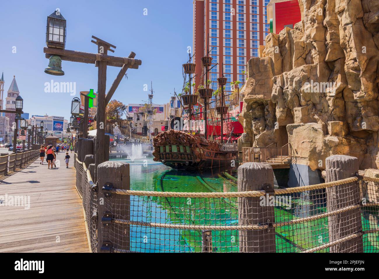 Beautiful view of territory of Treasure Island Hotel on the Strip with colorful decorated pond and pirate ship. Las Vegas. USA. Stock Photo