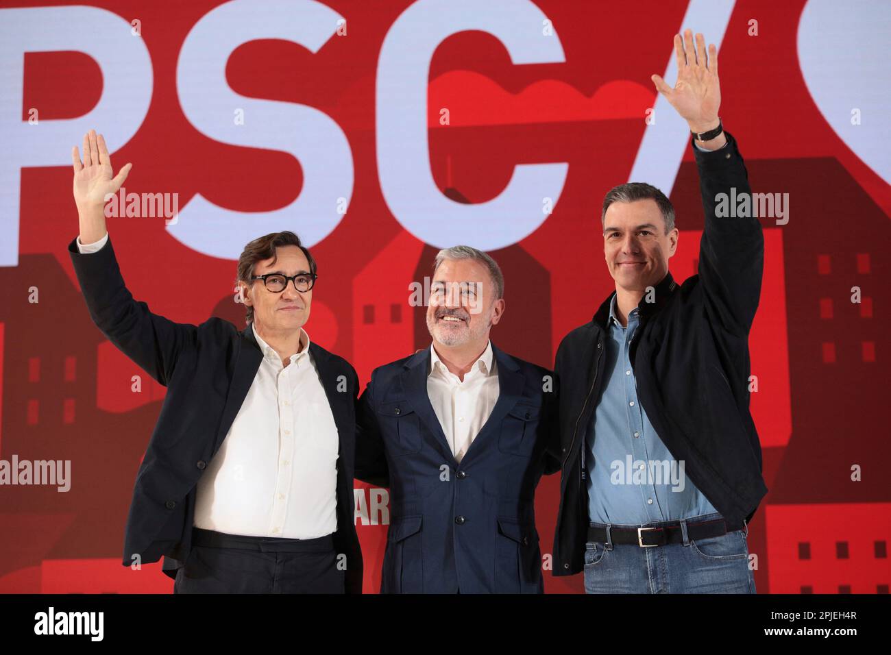 L-R) The leader of the PSC, Salvador Illa; the secretary general of the  PSOE and president of the Government, Pedro Sánchez; and the socialist  candidate for mayor of Barcelona Jaume Collboni; intervene