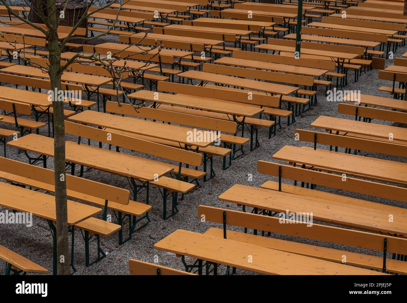 Munich, Germany. 02nd Apr, 2023. Beer tables and benches stand in the