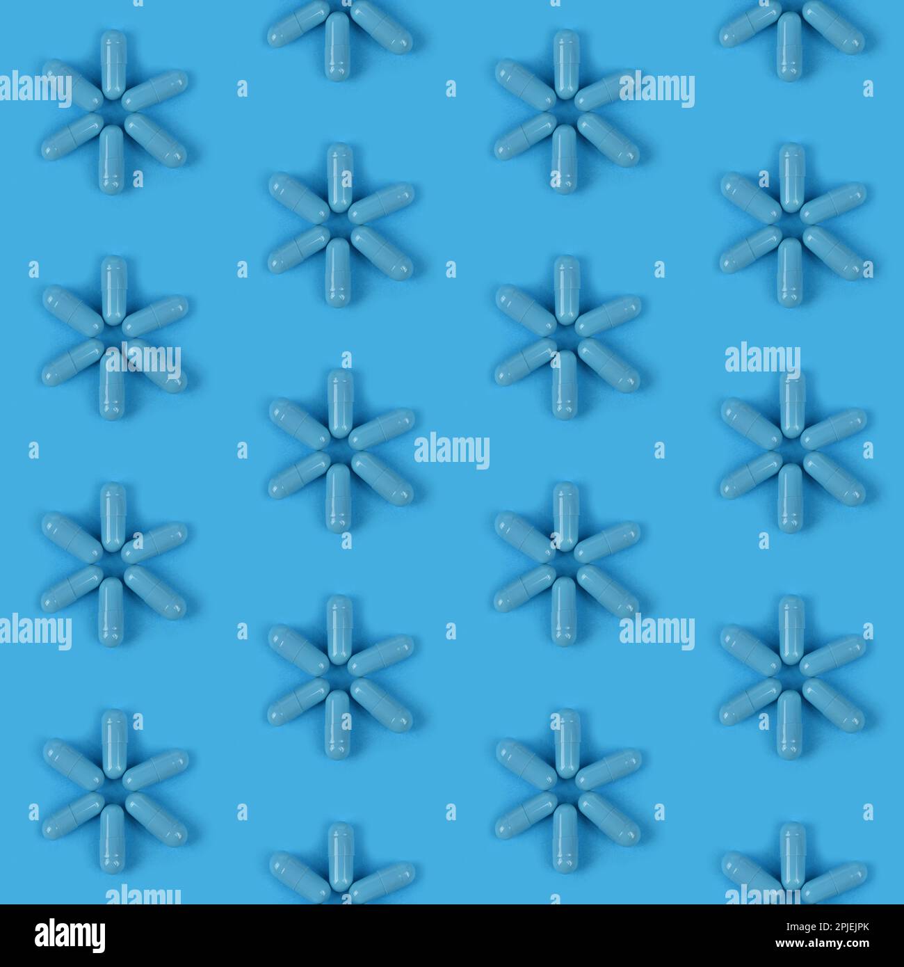 Tileable Capsules Pattern Seamless pattern. Blue medical capsules pill on blue background. High ...