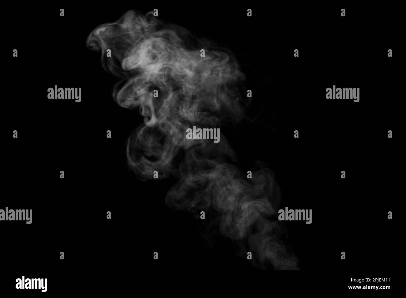 White curling dense smoke steam rising up is isolated on black background to overlay your photos. Steam background Stock Photo