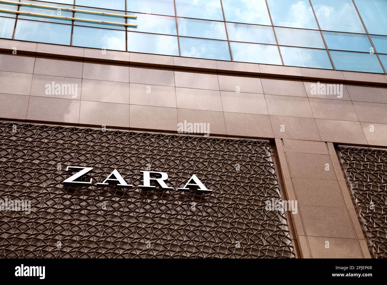 Ho Chi Minh City, Vietnam - March 28, 2023: Zara logo on a fast fashion store facade. Popular clothing brand sign outside a shopping mall Stock Photo