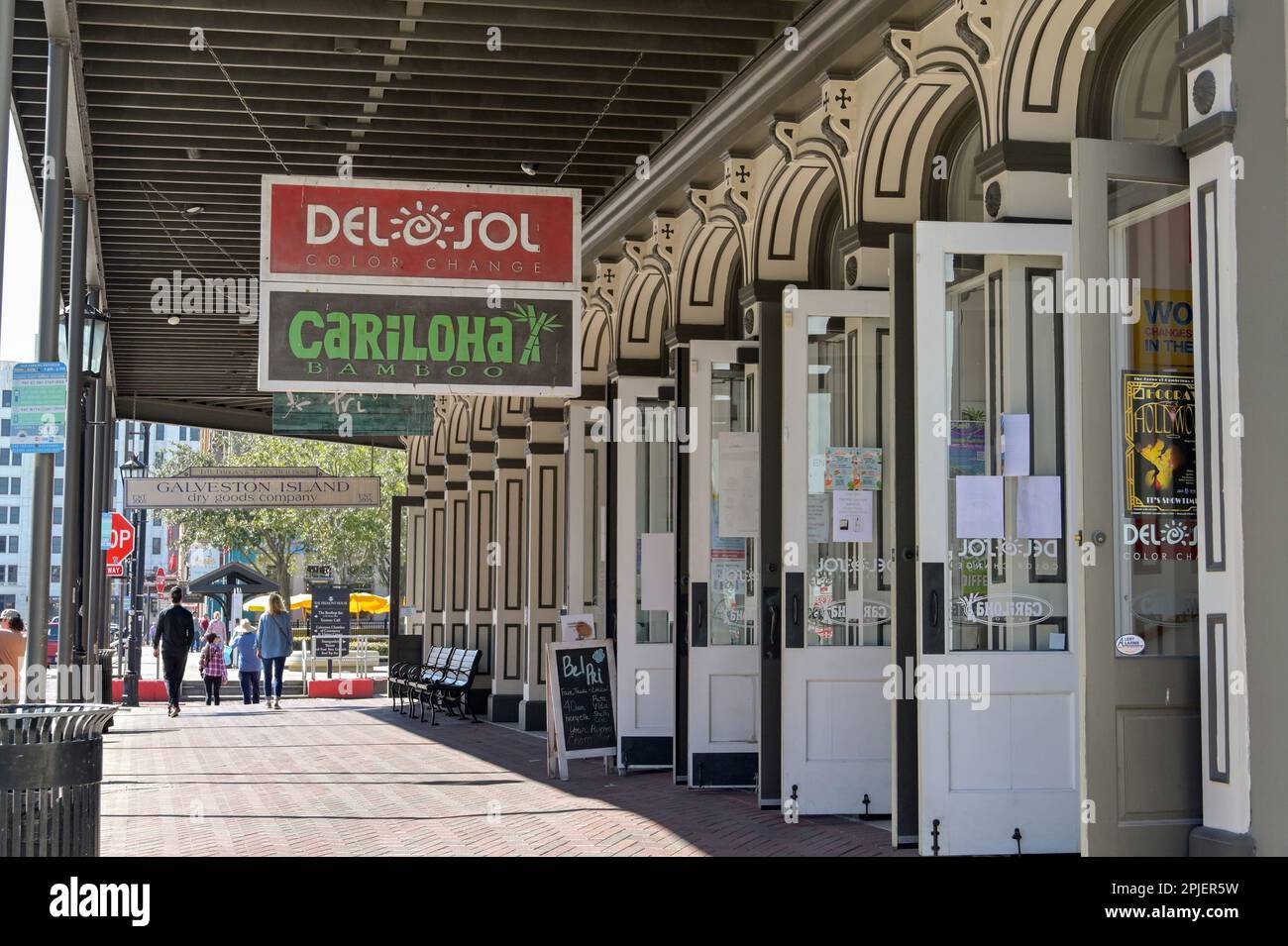 Galveston, Texas, USA - February 2023: Open doors on the front of a bar and restaurant on one of the main streets in the city Stock Photo