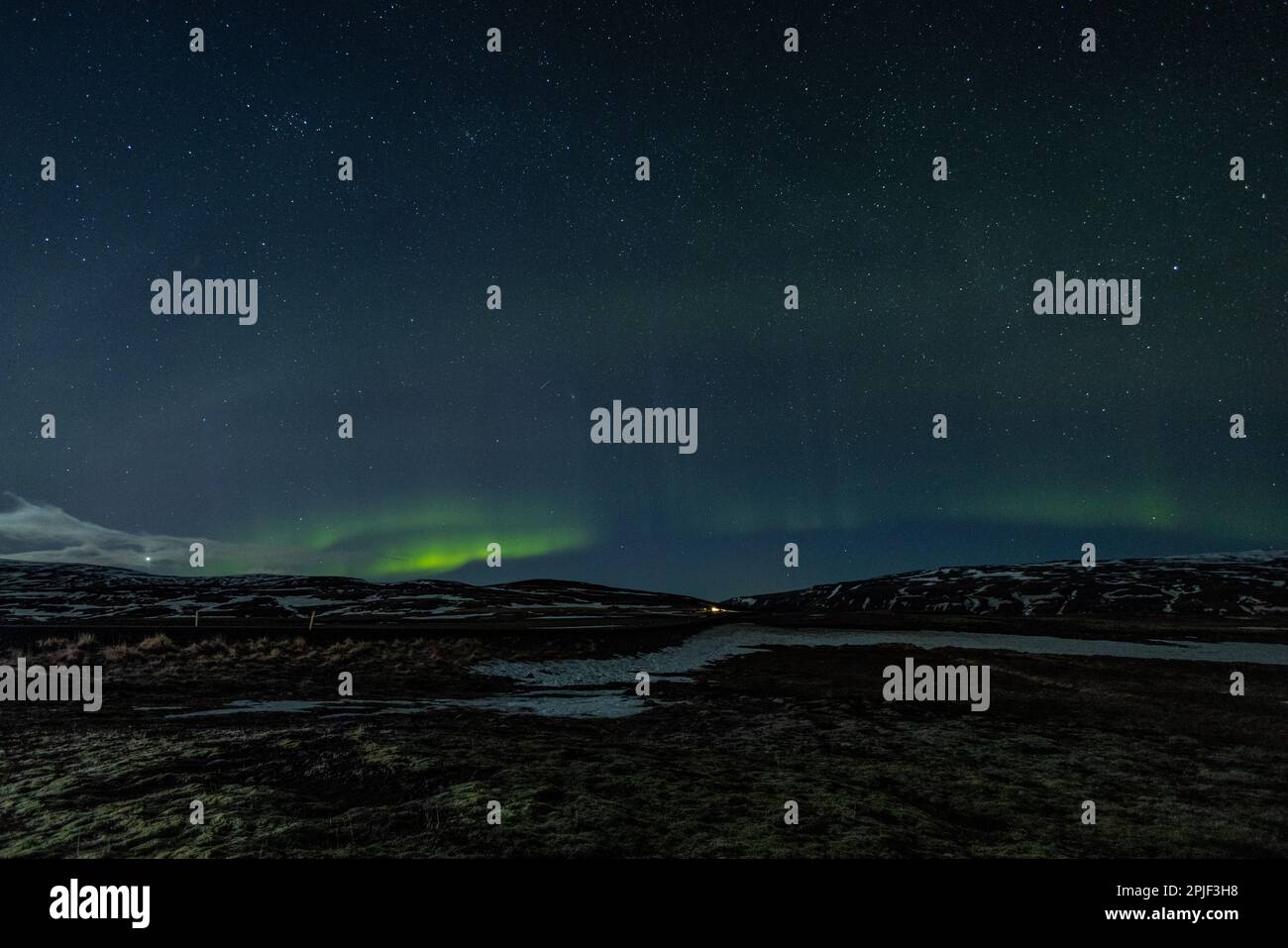 The Aurora Borealis (Northern Lights) dancing in the skies above Reykjavik, Iceland, 27th March