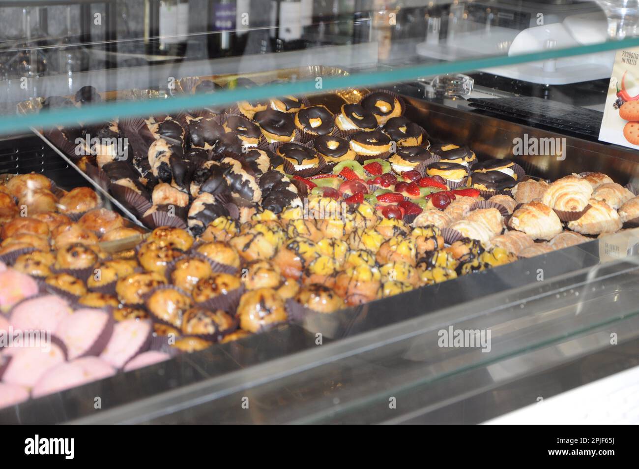 Patisserie display cakes artisanal bakery in italy bar Stock Photo Alamy