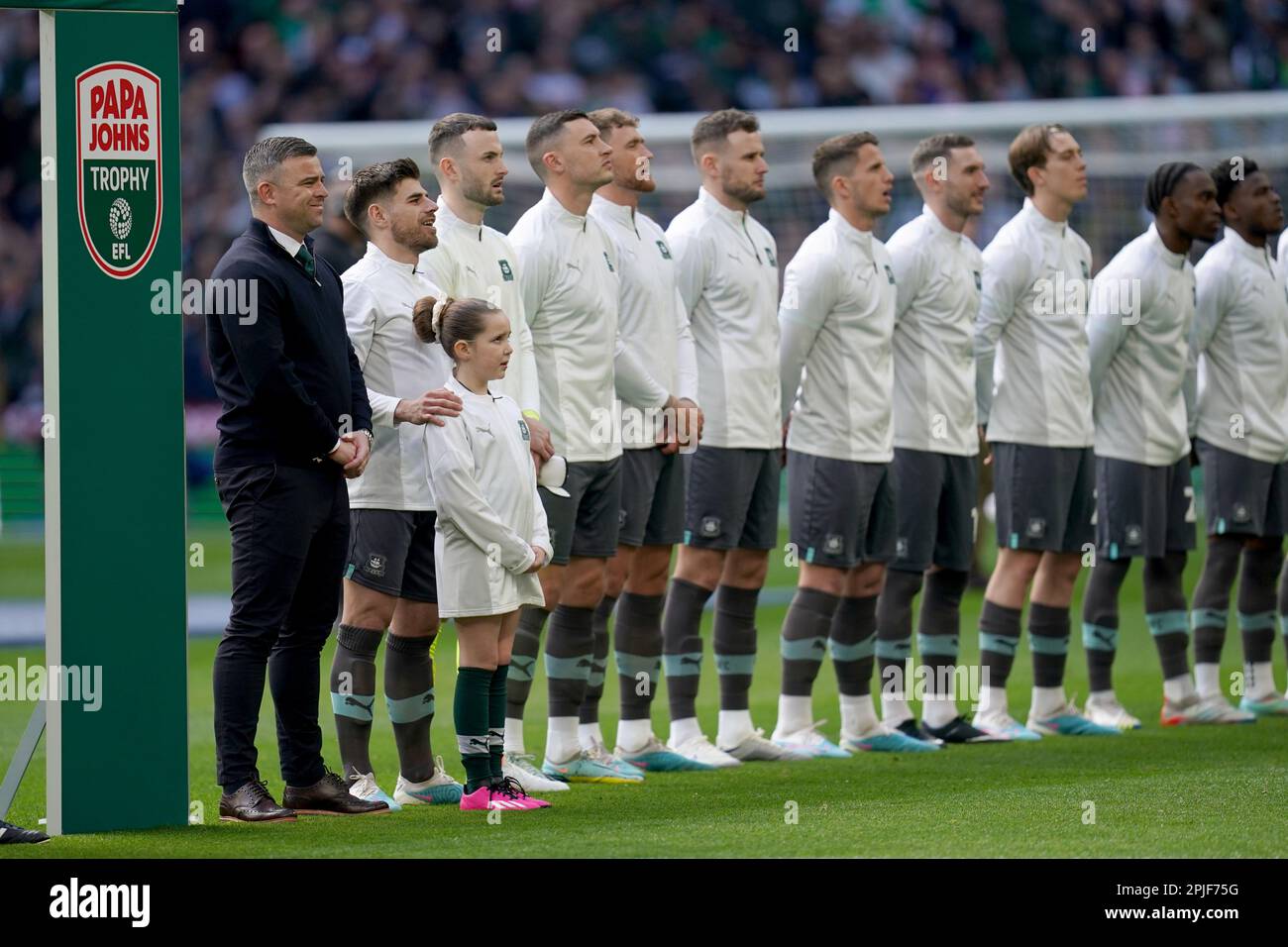 Plymouth Argyle line up alongside Plymouth Argyle Manager, Steven