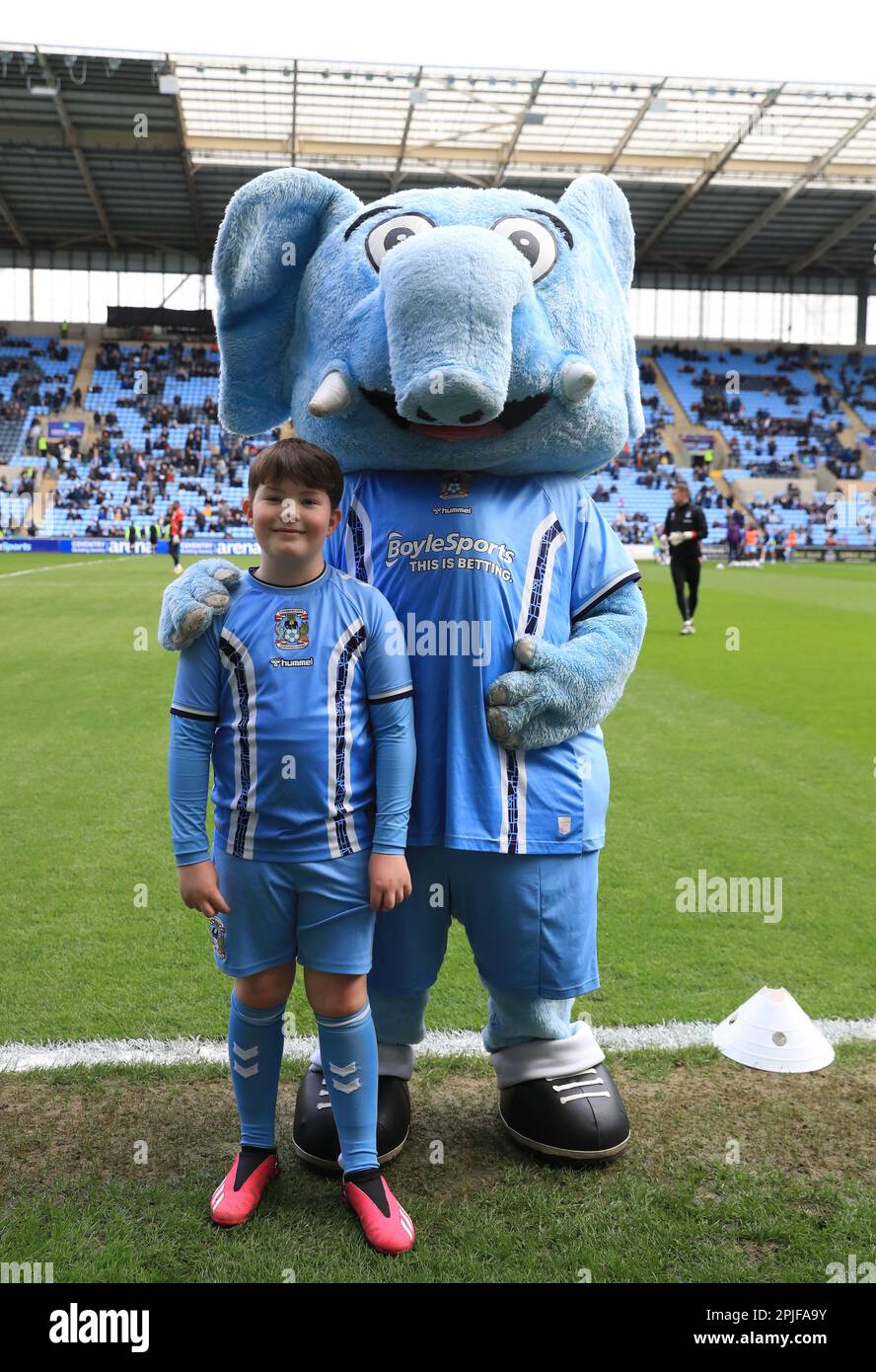 A Coventry City match day mascot poses with Sky Blue Sam ahead of the