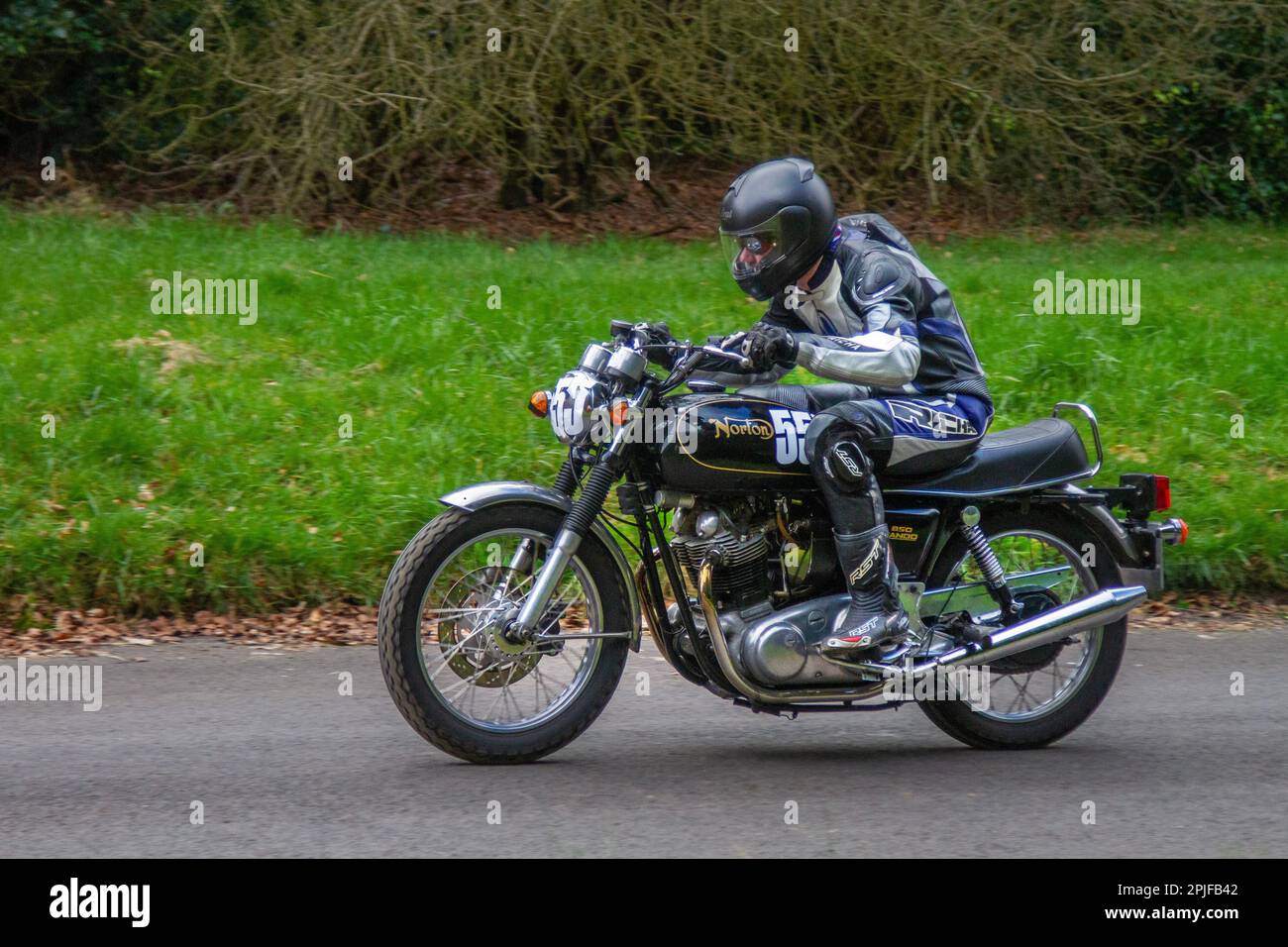 Bike No.555 1973 70s seventies, NORTON COMMANDO 850cc Supersport motorcycle ridden by Joseph Butterworth; at the 2023 HOGHTON TOWER SPRINT COURSE 1/8th timed mile drive. Stock Photo