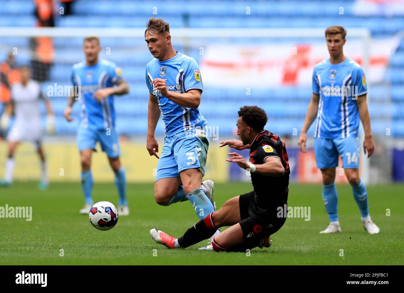 Coventry City's Callum Doyle battles for the ball with Stoke City's Jacob Brown during the Sky Bet Championship match at the Coventry Building Society Arena, Coventry. Picture date: Saturday April 1, 2023. Stock Photo