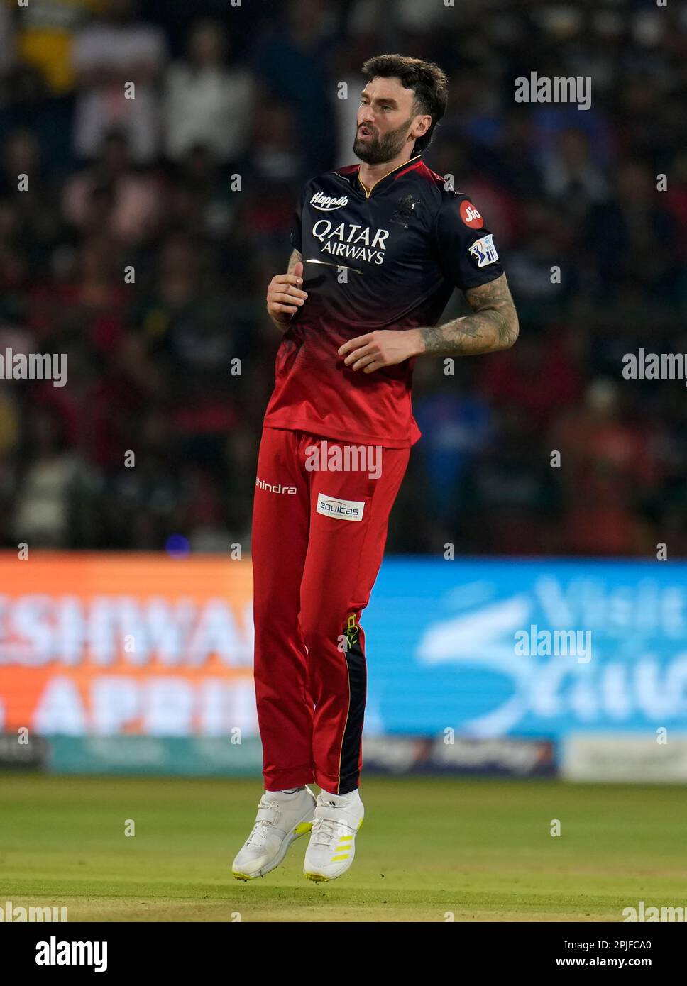 Royal Challengers Bangalore's Reece Topley reacts after bowling a ...