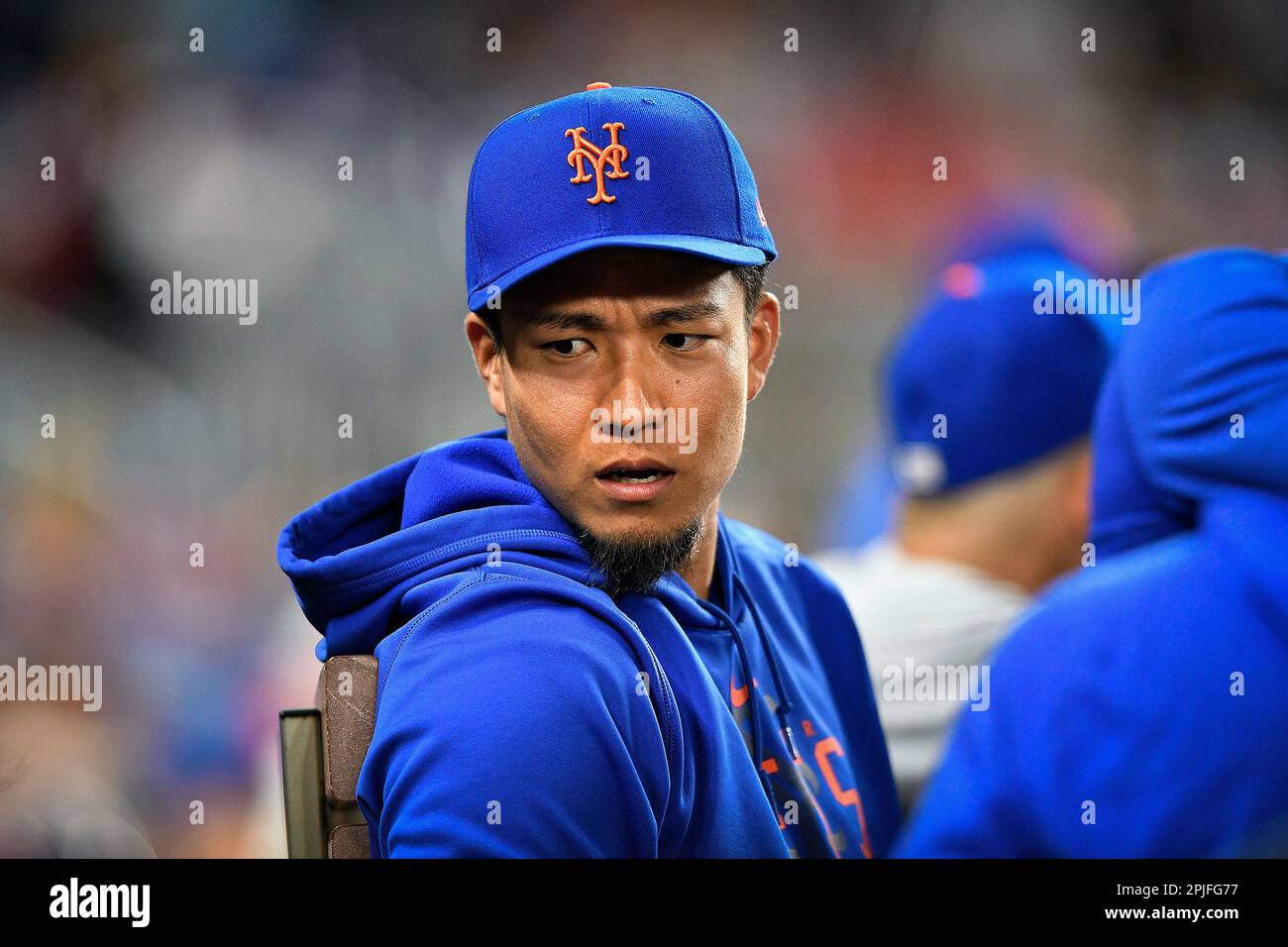 New York Mets pitcher Kodai Senga talks in the dugout during the eighth  inning of a baseball game against the Miami Marlins, Saturday, April 1,  2023, in Miami. (AP Photo/Michael Laughlin Stock