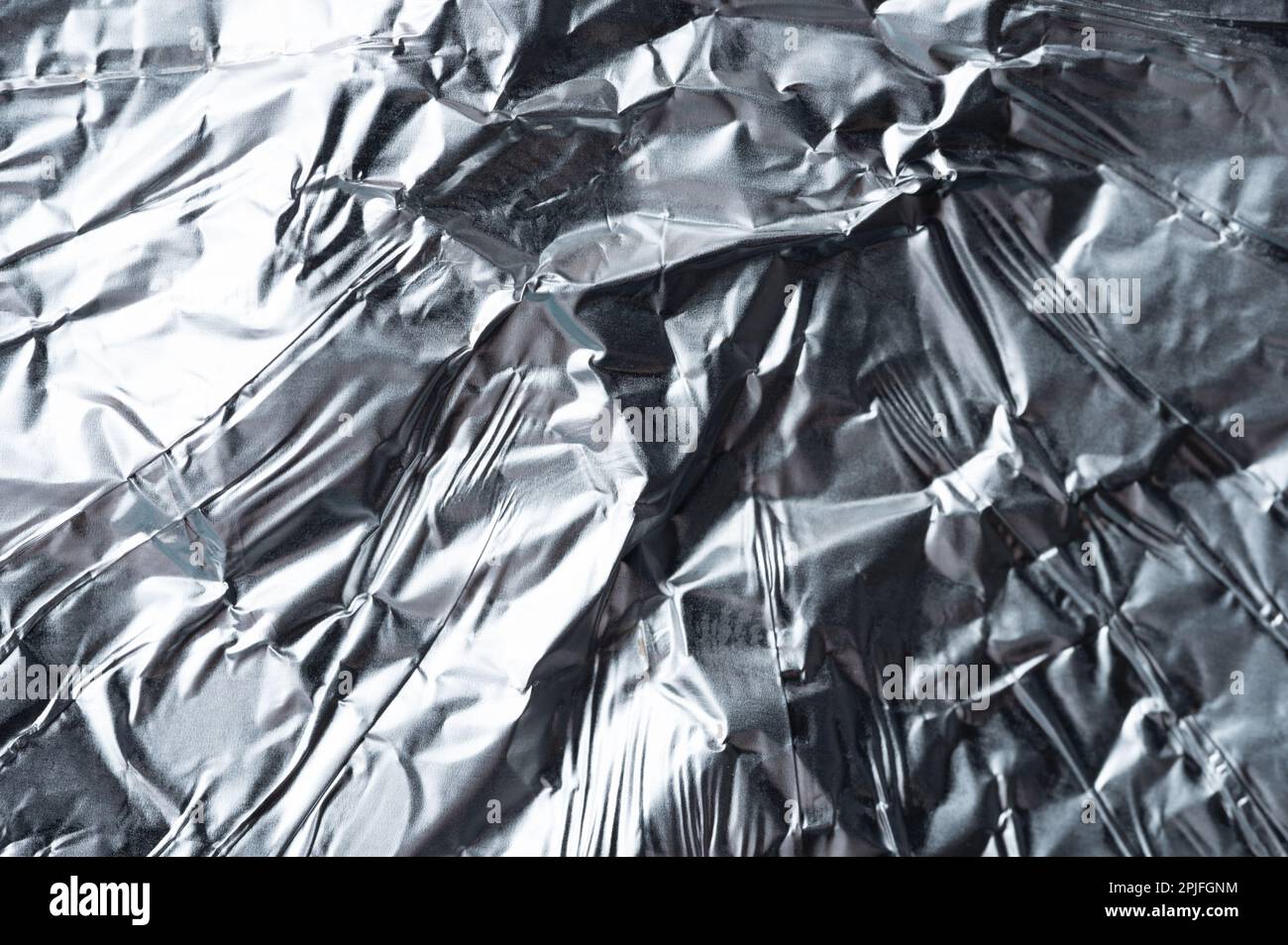Shiny foil silver background macro close up view Stock Photo
