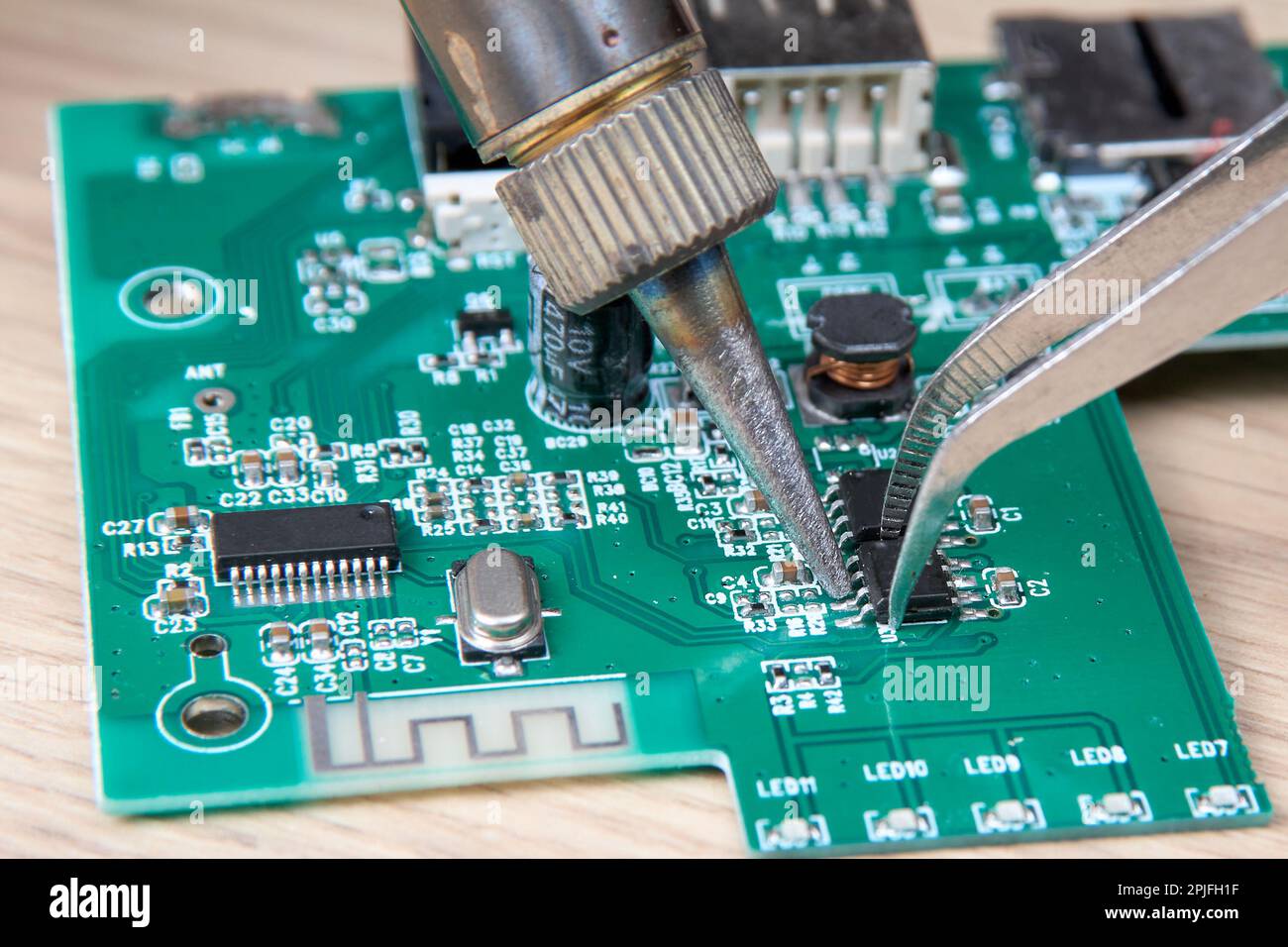 Repair of an electronic board by replacing a damaged part with a