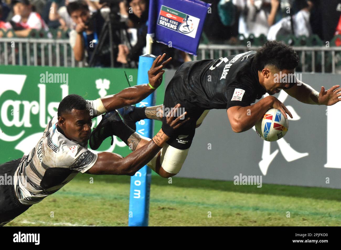 Hong Kong. 2nd Apr, 2023. Ngarohi McGarvey-Black (R) of New Zealand competes during the men's final match between New Zealand and Fiji at World Rugby Sevens Series 2023 in south China's Hong Kong, April 2, 2023. Credit: Lo Ping Fai/Xinhua/Alamy Live News Stock Photo