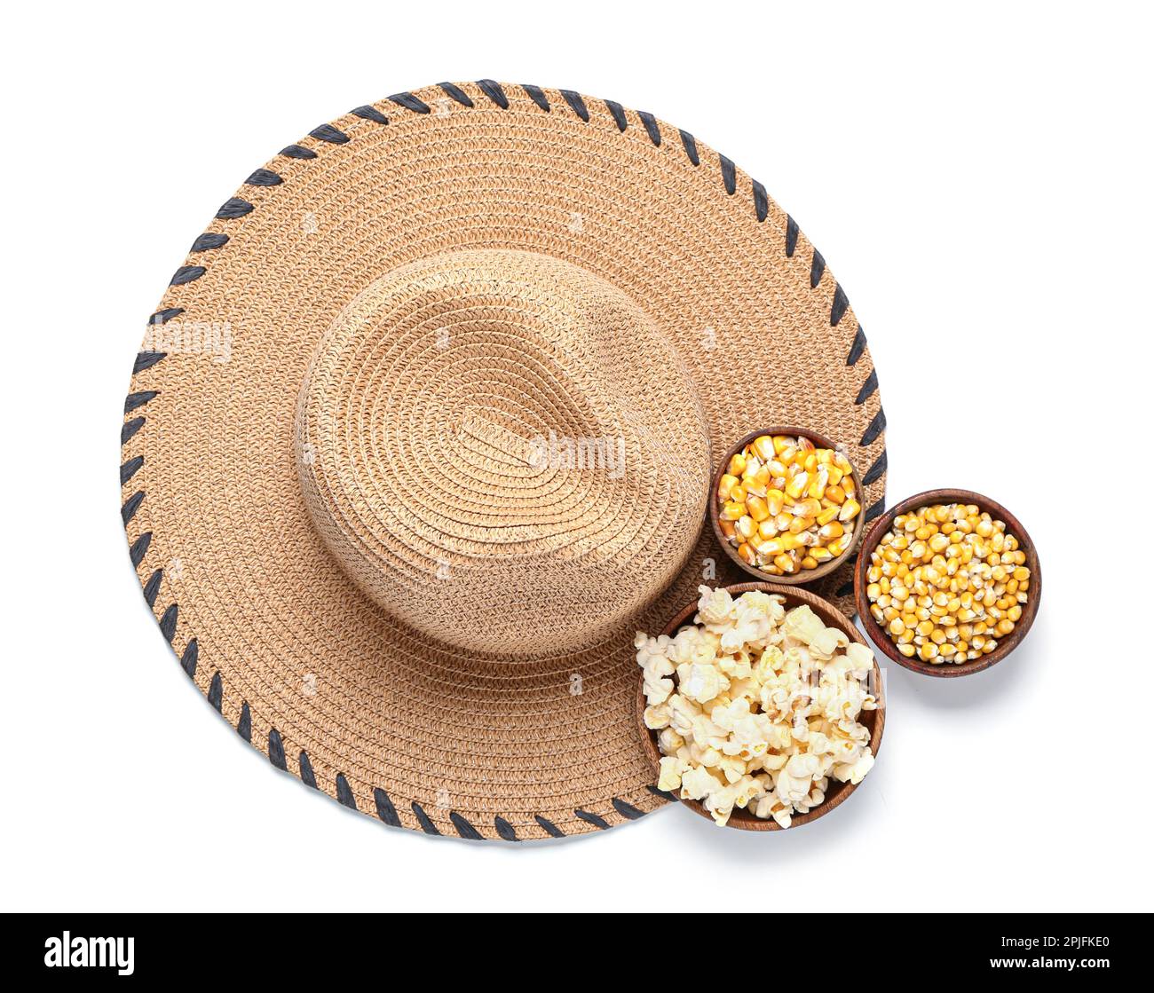 Bowls of corn and straw hat on white background. Festa Junina (June