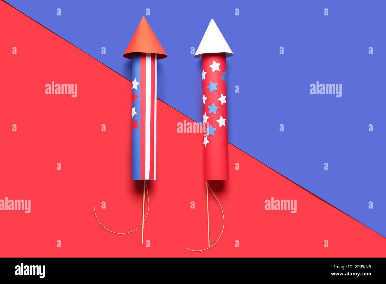Firework rockets for Independence Day on blue and red background Stock ...