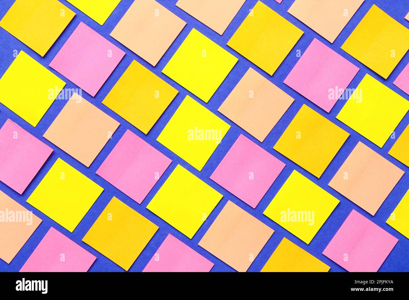 Colorful sticky notes on blue background Stock Photo - Alamy