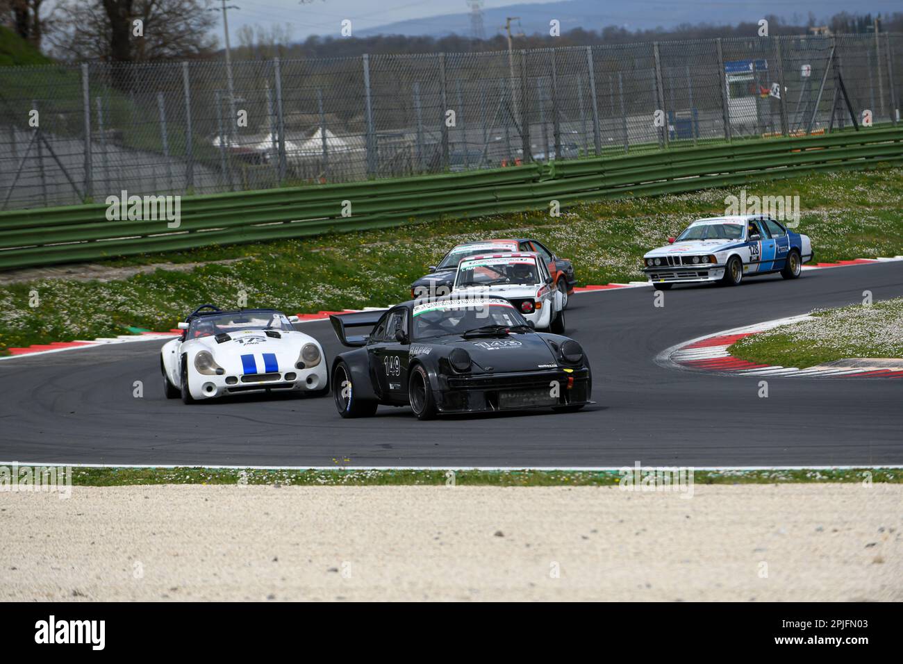 Vallelunga 'Piero Taruffi' circuit, Racing weekend, April 2nd 2023, Italy. Motorsport Historical car race, 300 Km di Vallelunga. Porsche 930 leads group of cars in action during the race. Photo Credit: Fabio Pagani/Alamy Live News Stock Photo