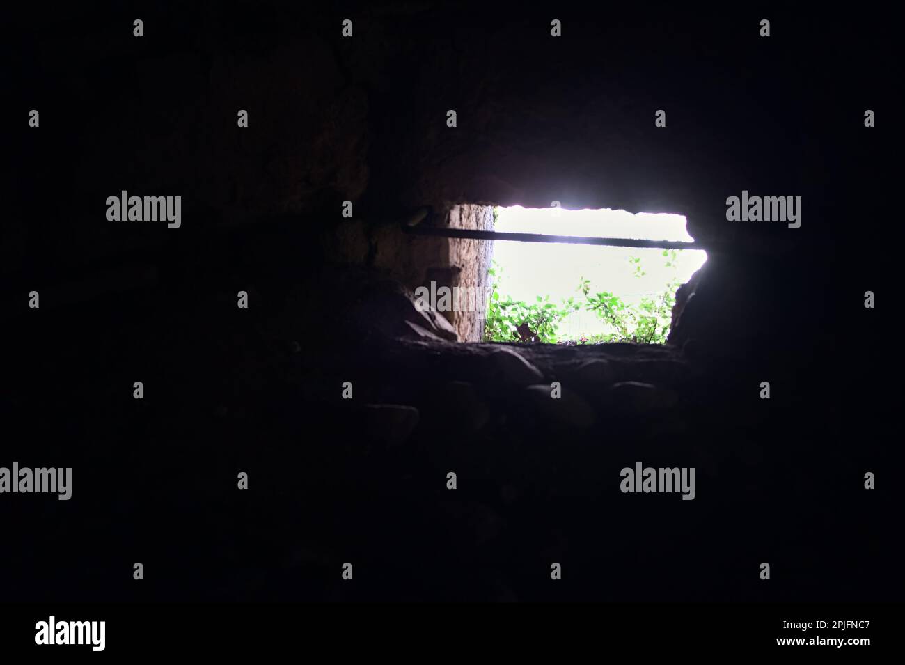 Opening in a wall with grating Stock Photo Alamy