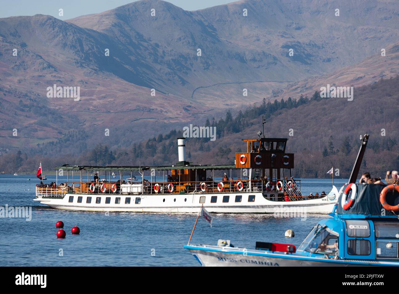 2nd April  2023 .UK Weather  Lake Windermere  Sunny afternoon brings out boats of all sizes to make the most of the weather > The MV Tern   built 1983 Credit: Gordon Shoosmith/ Live News Stock Photo