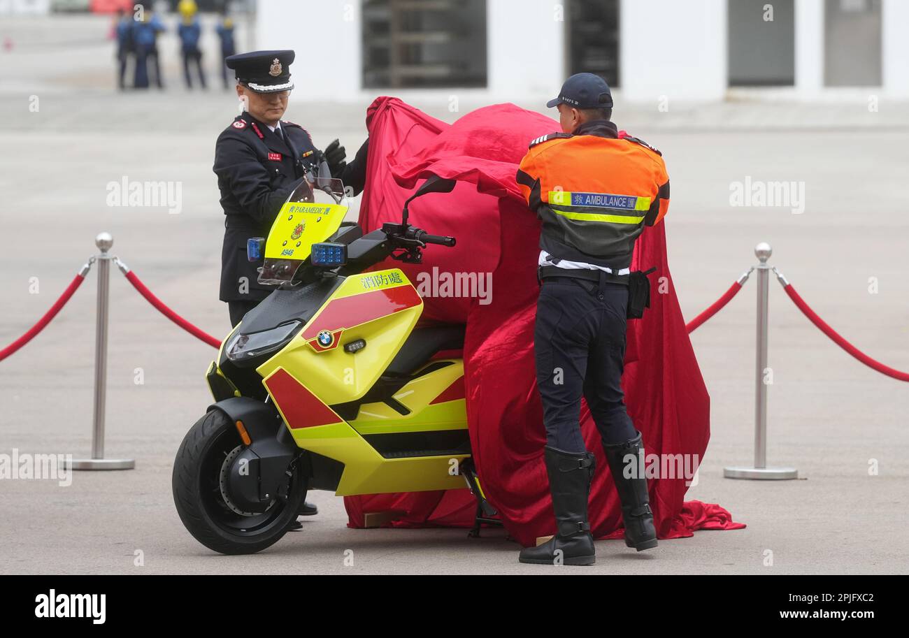 Assistant Director (Ambulance) of Fire Services Department Terence Ng Hau-ming unveils the department's newly launched electric rapid response motorcycles at the Fire and Ambulance Services Academy.  27MAR23    SCMP / Elson Li Stock Photo