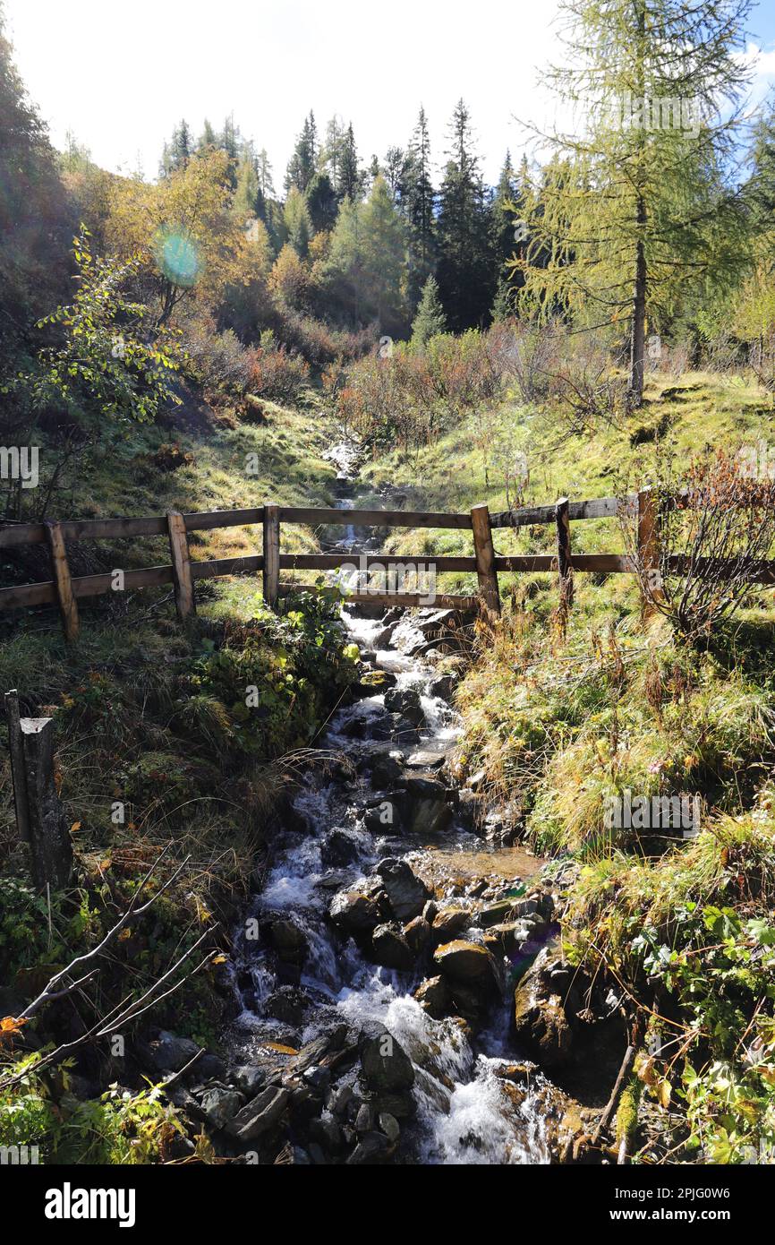 a bridge and river in the alps Stock Photo - Alamy