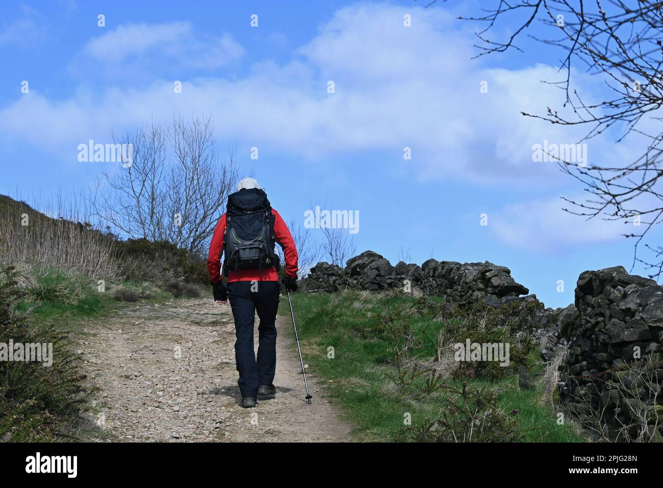 A man walks near the summit of Lantern Pike on the outskirts of