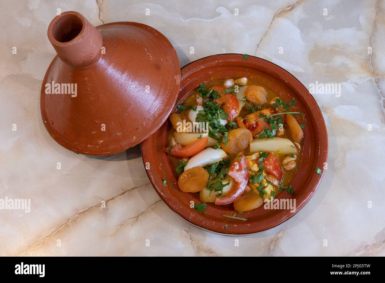 Tunisian dishe culinary Still Life. Tagine with apricot and cinnamon