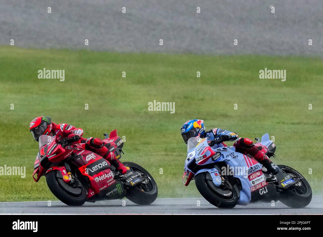 Italian rider Francesco Bagnaia of Ducati Lenovo Team overtakes Spanish ...