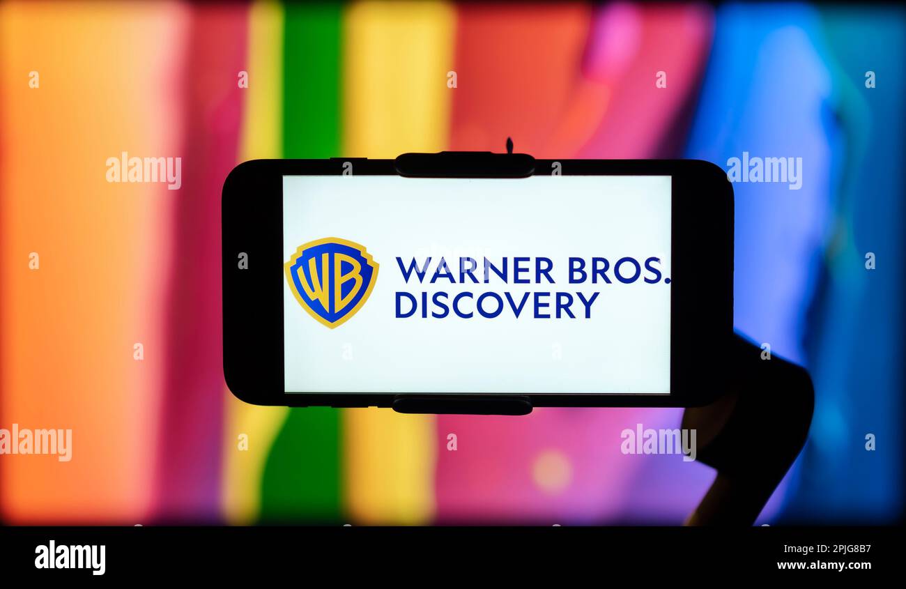 In this photo illustration, the Warner Bros. Discovery logo is seen displayed on a mobile phone screen. Stock Photo