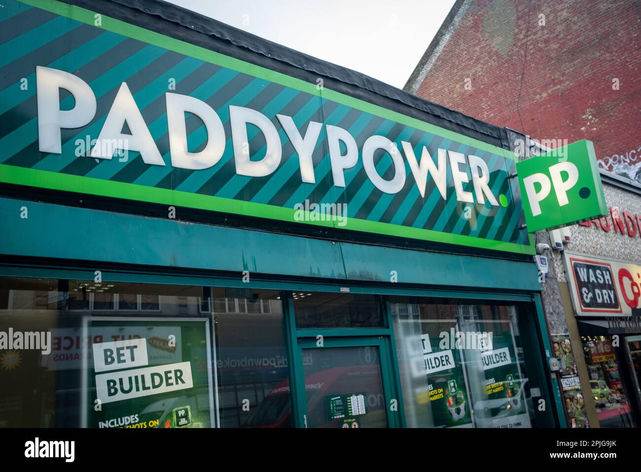 London- Paddy Power exterior signage,  an Irish bookmaker with many high street betting shops across the UK. Stock Photo