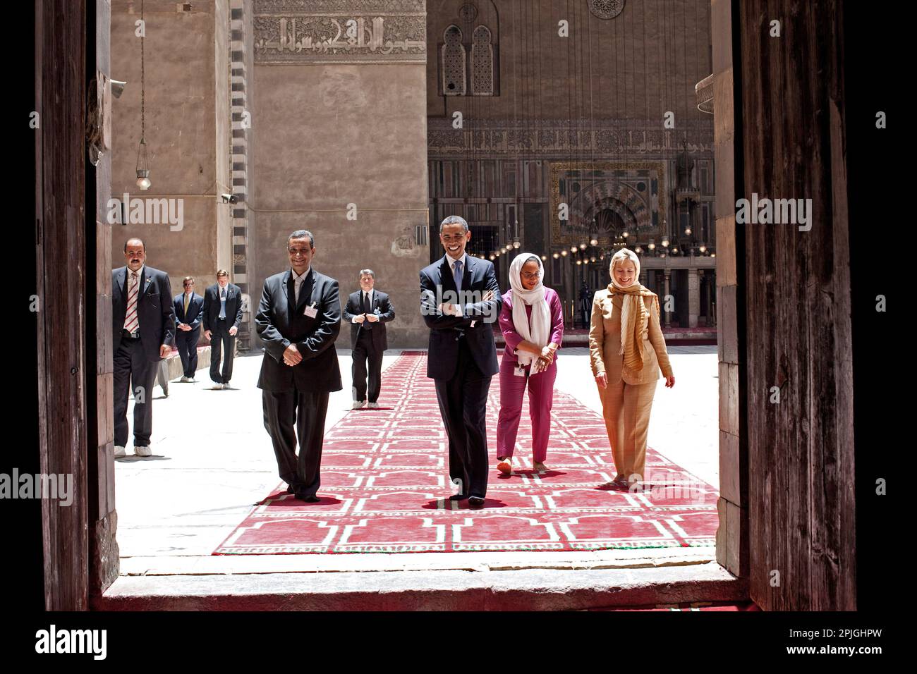 President Barack Obama tours the Sultan Hassan Mosque with Dr. Zahi Hawass (left), Iman Abdel Fateh (right), and Secretary of State Hillary Clinton in Cairo, Egypt, June 4, 2009. (Official White House Photo by Pete Souza).  This official White House photograph is being made available for publication by news organizations and/or for personal use printing by the subject(s) of the photograph. The photograph may not be manipulated in any way or used in materials, advertisements, products, or promotions that in any way suggest approval or endorsement of the President, the First Family, or the White Stock Photo
