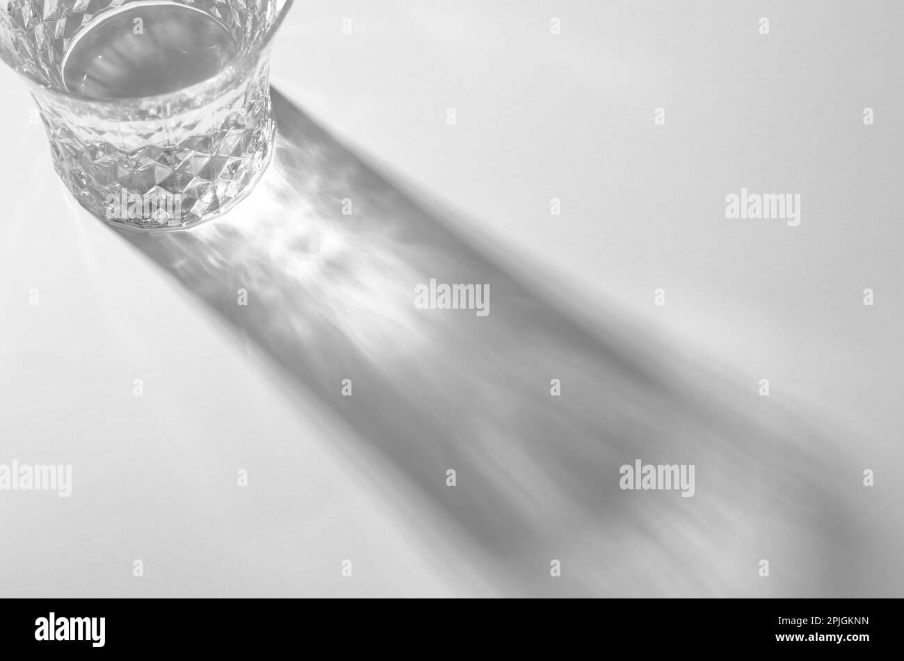 A Glass with Water and Sharp Shadows, Caustic Effect as Light Passes