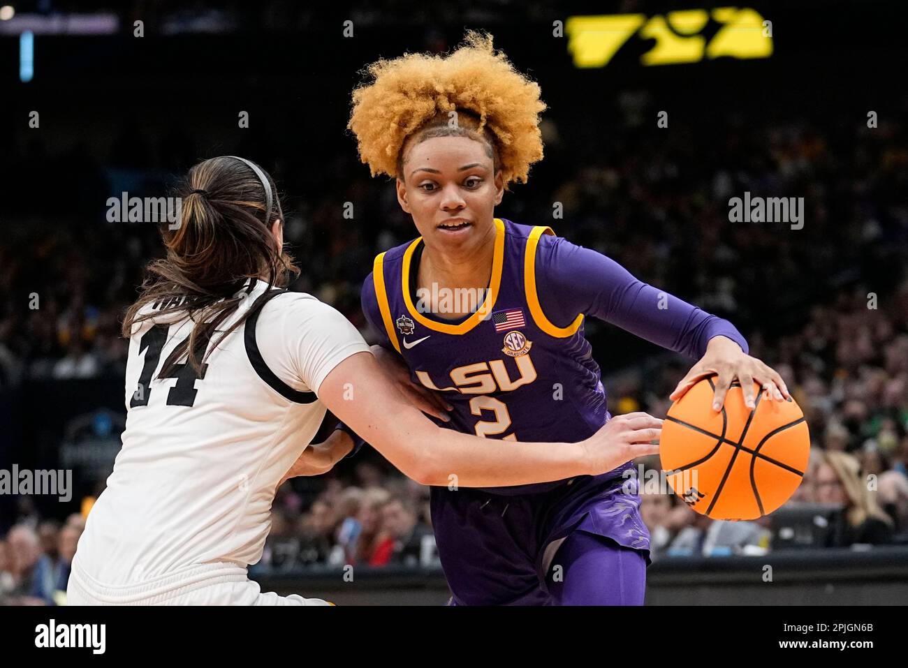 LSU's Jasmine Carson tries to get past Iowa's McKenna Warnock during