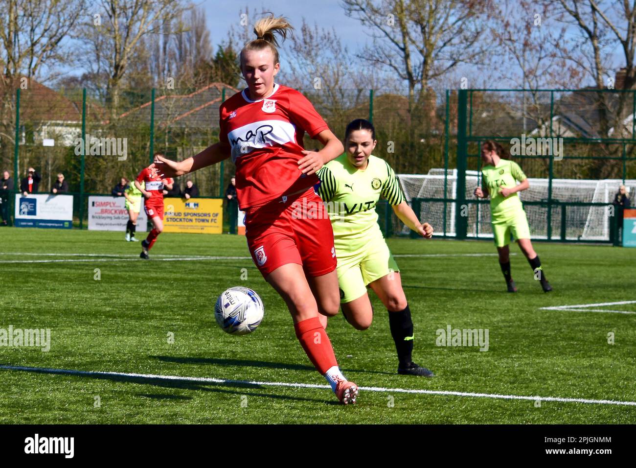 Teesside, UK. 02 Apr 2023. Jess Mett (Middlesbrough) in action as Middlesbrough Women FC (in red and white) played Stockport County Ladies FC in the FA Women’s National League Division One North. The visitors won 1-6 at the Map Group UK Stadium in Stockton-on-Tees - a scoreline which was harsh on the home side. Credit: Teesside Snapper/Alamy Live News Stock Photo