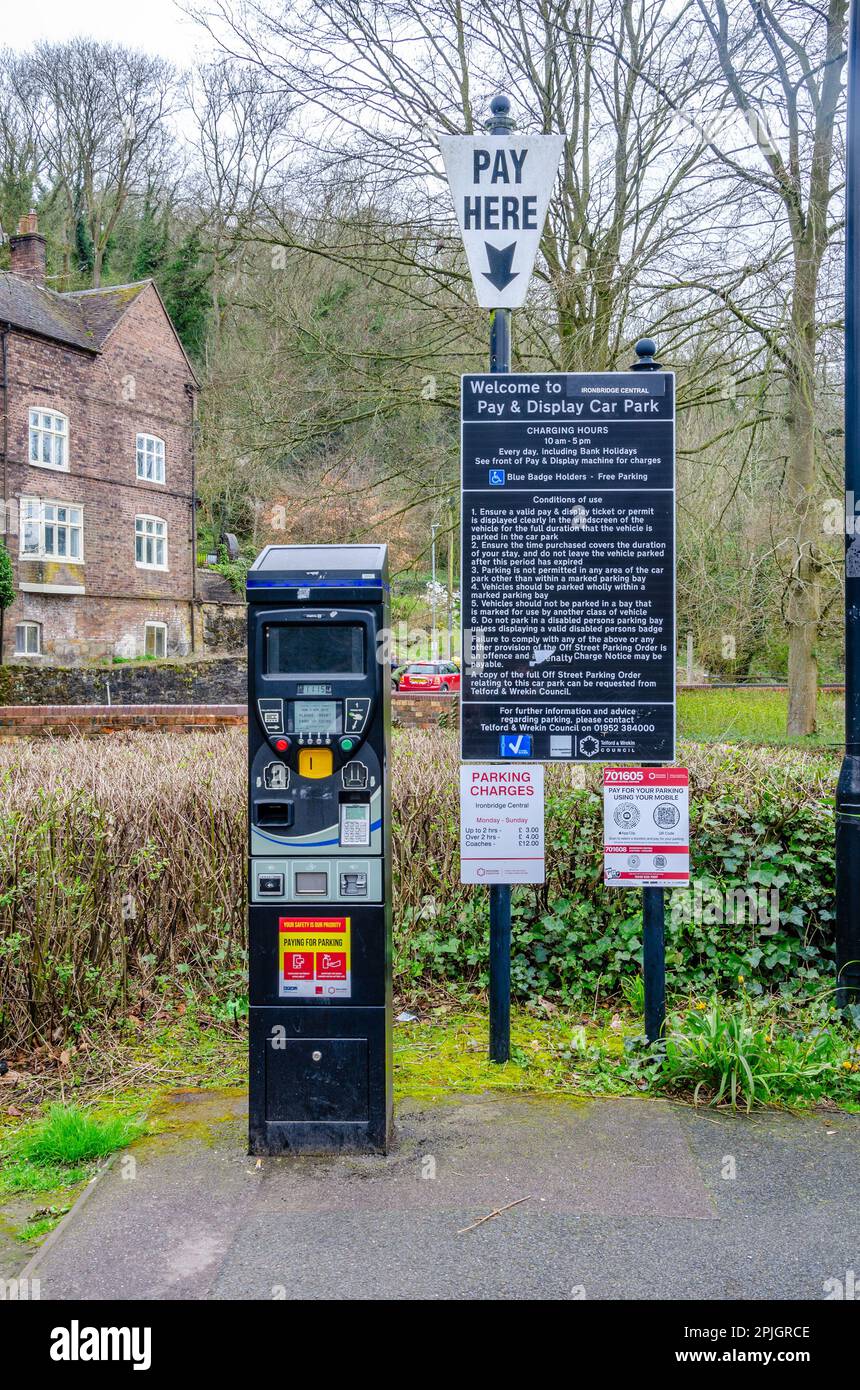 A ticketing machine at a pay and display car park in Ironbridge Shropshire, UK where motorists pay for their parking Stock Photo