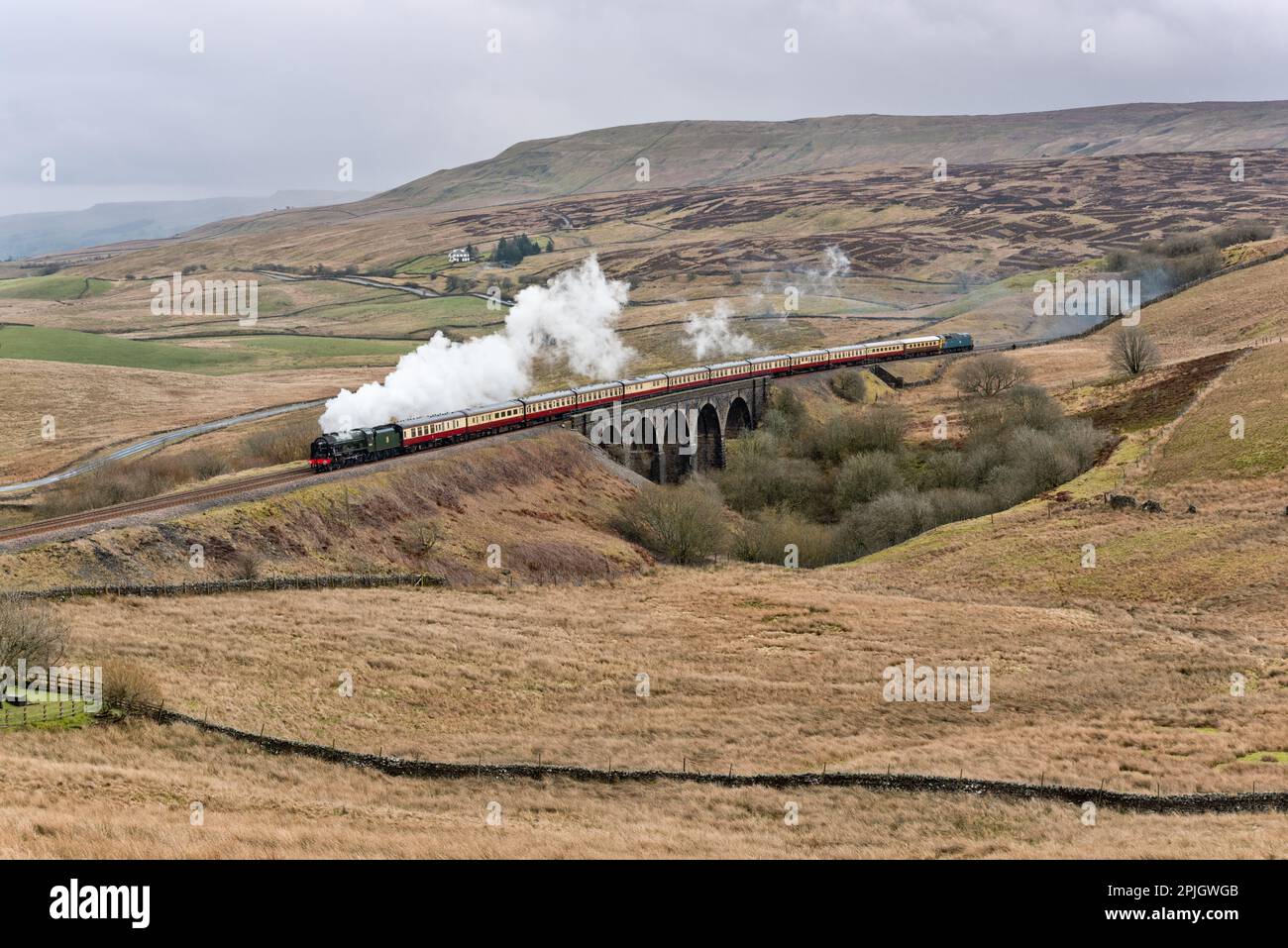 Steam locomotive 'Royal Scot' hauls a special train over Lunds Viaduct (near Garsdale) on the Settle-Carlisle railway, heading north to Carlisle. Stock Photo
