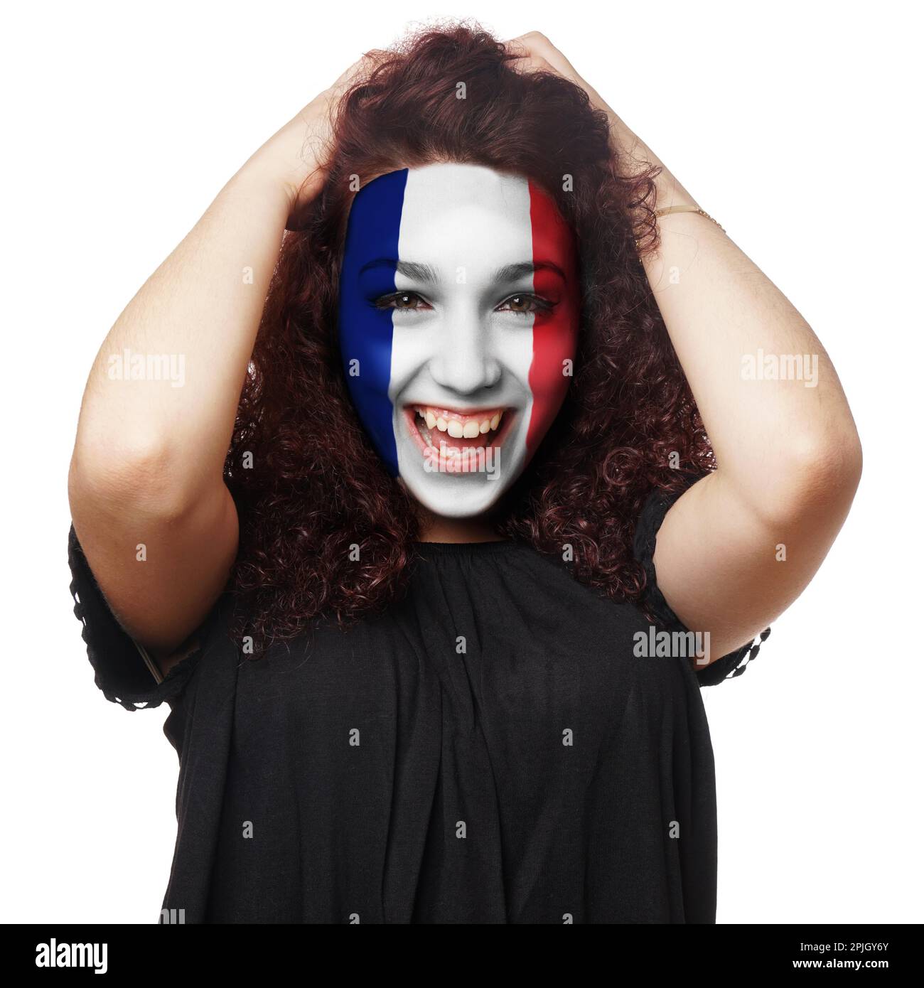 girl with french flag face paint. female soccer fan from france Stock Photo