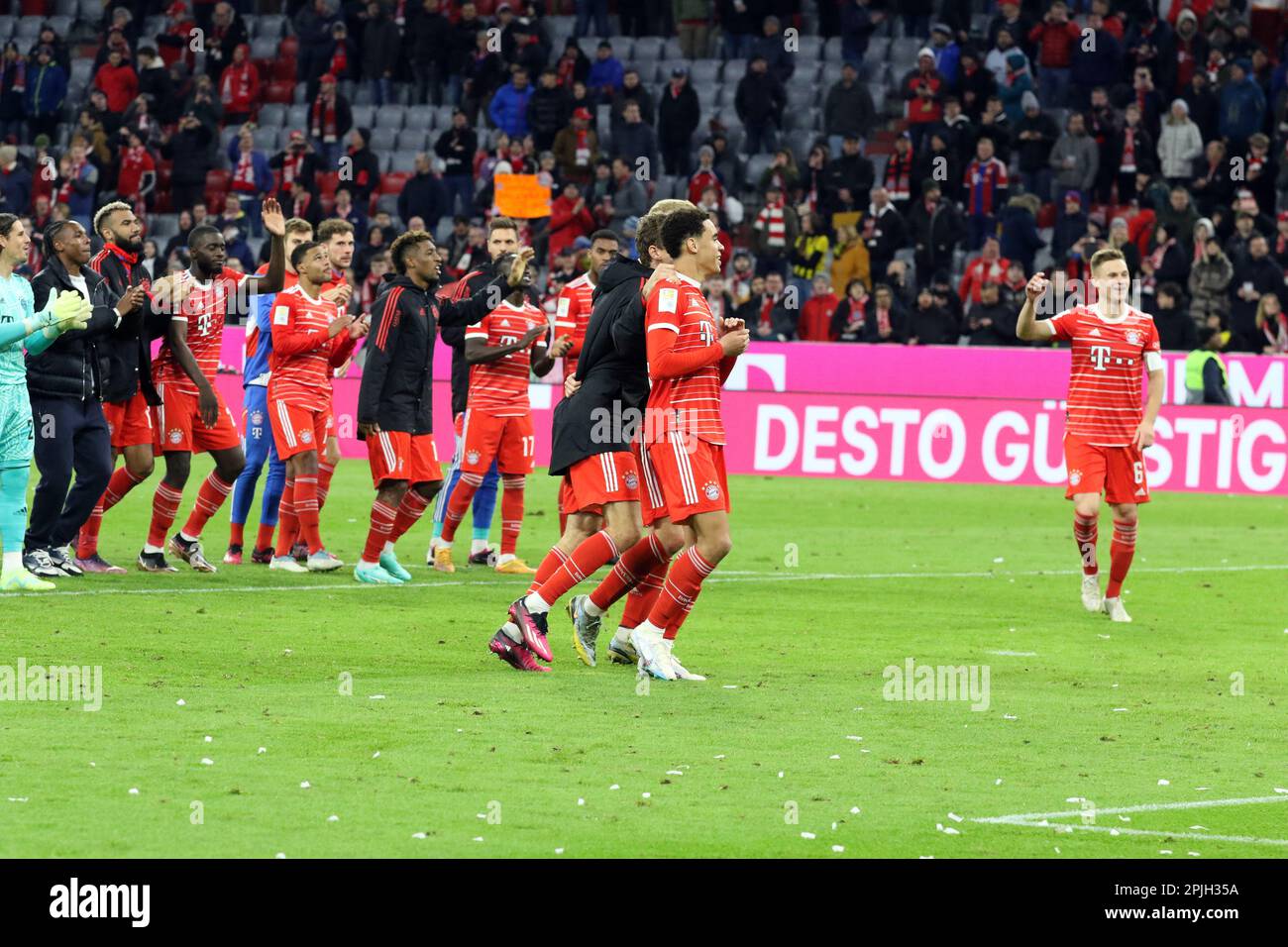 MUNICH, Germany - 01. APRIL 2023: FcBayern players celebrate the 4:2 victory over the hardest Bundesliga rival. 27 Yann SOMMER, FcB Keeper, 2 Dayot UPAMECANO, 4 Matthijs de LIGT, 5 Benjamin PAVARD, 6 Joshua KIMMICH, 8 Leon GORETZKA, 10 Leroy SANƒ, Sane, 11 Kingsley COMAN, 13 Eric Maxim CHOUPO-MOTING, 19 Alphonso DAVIES, 25 Thomas MUELLER, MŸller, 7 Serge GNABRY, 17 Sadio MANƒ, Mane, 22 Joao CANCELO, 38 Ryan GRAVENBERCH, 42 Jamal MUSIALA, after the Bundesliga Football match between Fc Bayern Muenchen and BvB Dortmund at the Allianz Arena in Munich on 1. April 2023, Germany. DFL, Fu Stock Photo