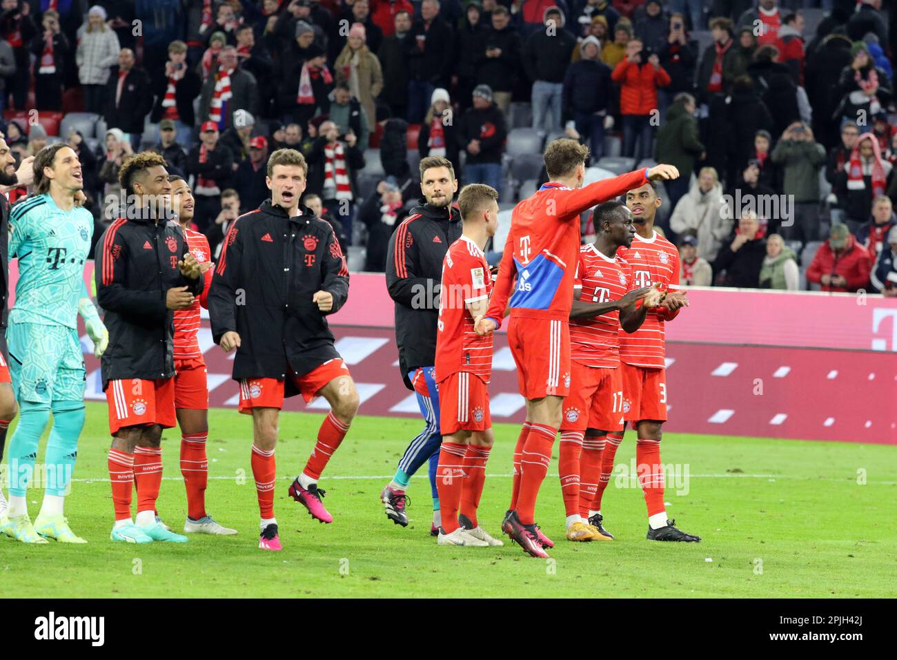 MUNICH, Germany - 01. APRIL 2023: FcBayern players celebrate the 4:2 victory over the hardest Bundesliga rival. 27 Yann SOMMER, FcB Keeper, 2 Dayot UPAMECANO, 4 Matthijs de LIGT, 5 Benjamin PAVARD, 6 Joshua KIMMICH, 8 Leon GORETZKA, 10 Leroy SANƒ, Sane, 11 Kingsley COMAN, 13 Eric Maxim CHOUPO-MOTING, 19 Alphonso DAVIES, 25 Thomas MUELLER, MŸller, 7 Serge GNABRY, 17 Sadio MANƒ, Mane, 22 Joao CANCELO, 38 Ryan GRAVENBERCH, 42 Jamal MUSIALA, after the Bundesliga Football match between Fc Bayern Muenchen and BvB Dortmund at the Allianz Arena in Munich on 1. April 2023, Germany. DFL, Fu Stock Photo