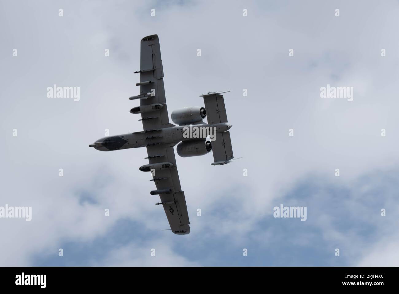 A-10 Thunderbolt IIs from the 175th Wing, Baltimore, M.d., displays a show of force during a close air support exercise on Range 48, Fort Drum, N.y. March 29, 2023. The close air support training was conducted by members of the 274th Air Support Operations Squadron and members of the Brazilian Air Force Para-SAR Squadron. Stock Photo