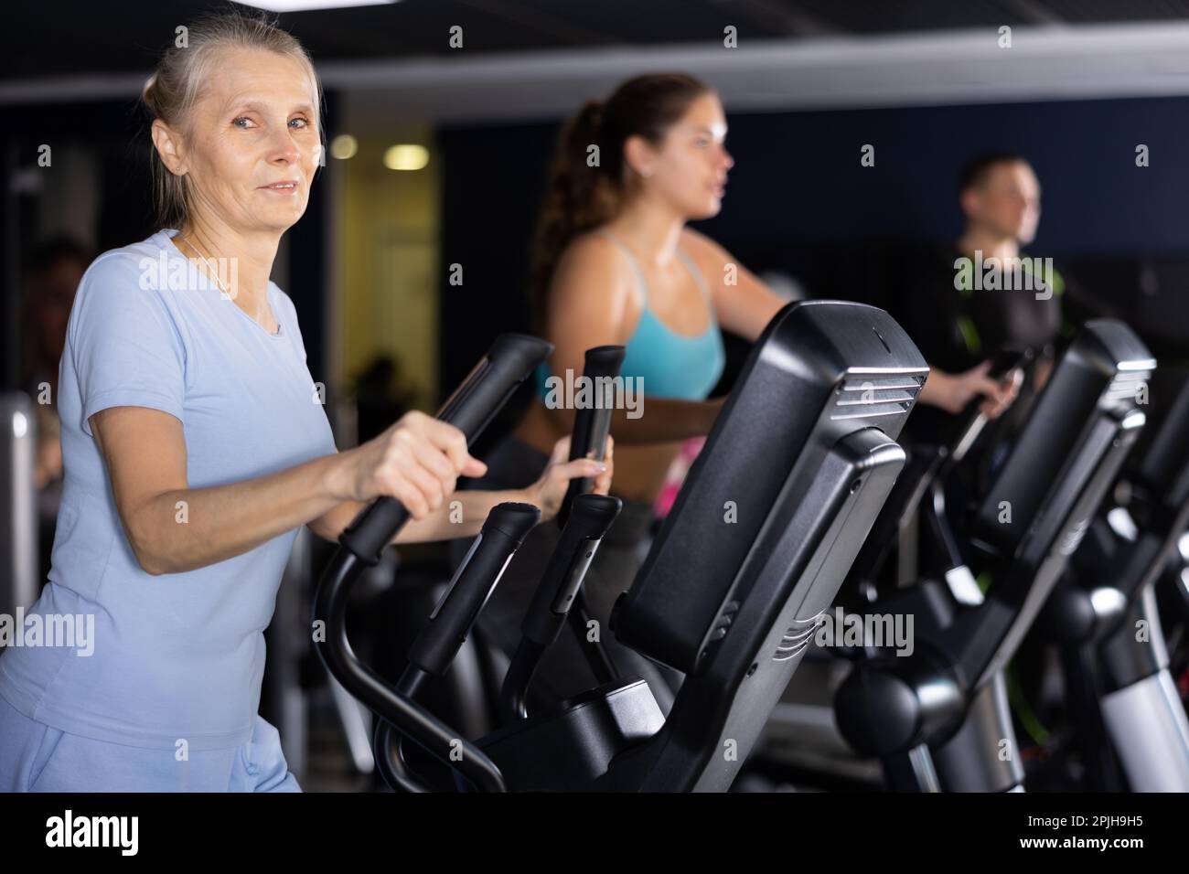 Mature woman power walk hi-res stock photography and images - Alamy