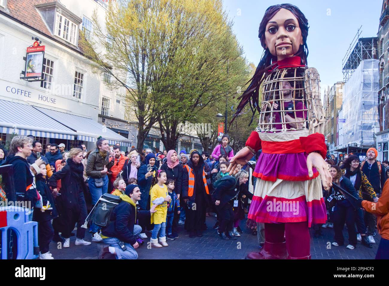 London, England, UK. 2nd Apr, 2023. Crowds flock around Little Amal ...