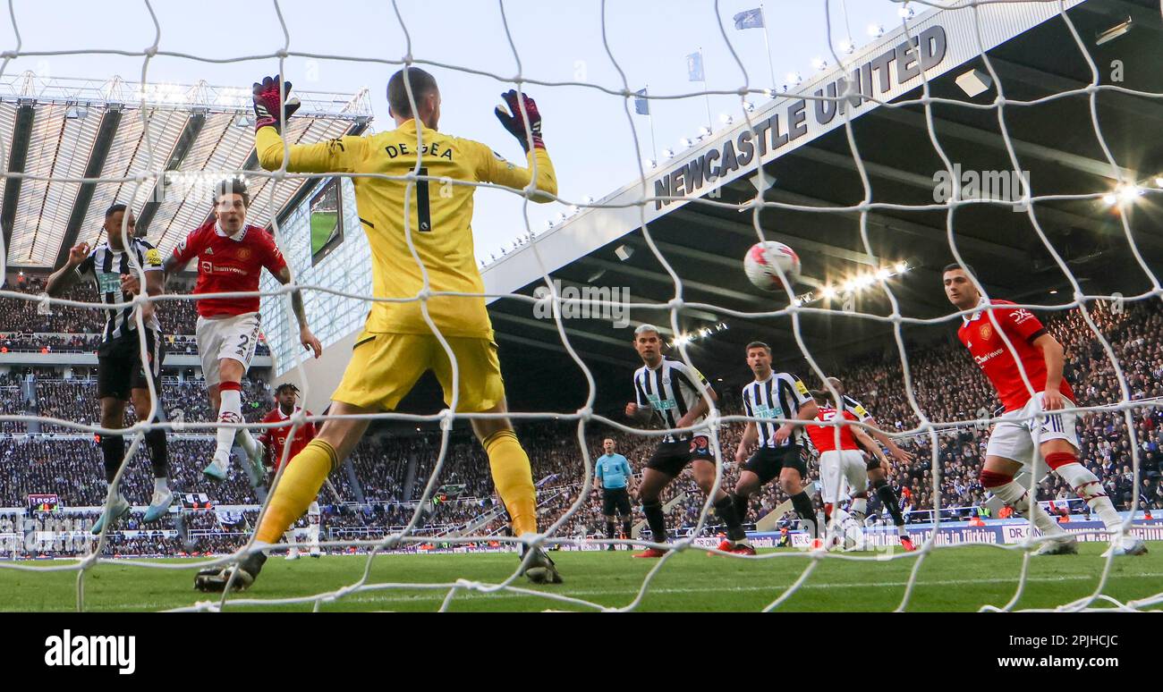 2nd April 2023; St James' Park, Newcastle, England: Premier League Football, Newcastle United versus Manchester United; Newcastle United's Callum Wilson scores his side's second goal with a header in the 88th minute to make the score 2-0 beating Manchester United's David De Gea Stock Photo