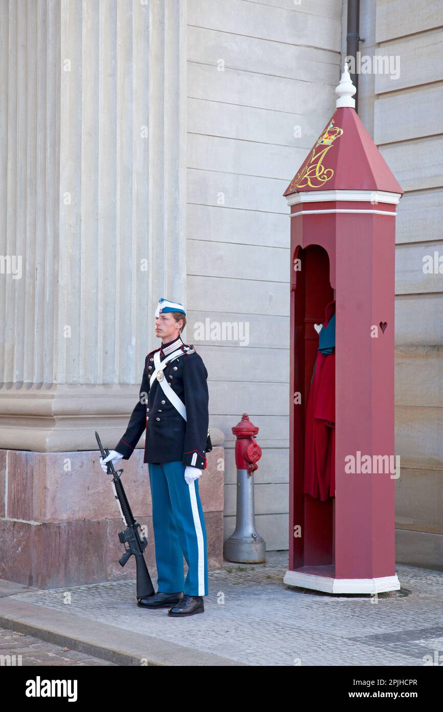 Copenhagen, Denmark - June 29 2019: Royal Life Guard at his sentry box guarding the entrance of the Amalienborg Palace. Stock Photo