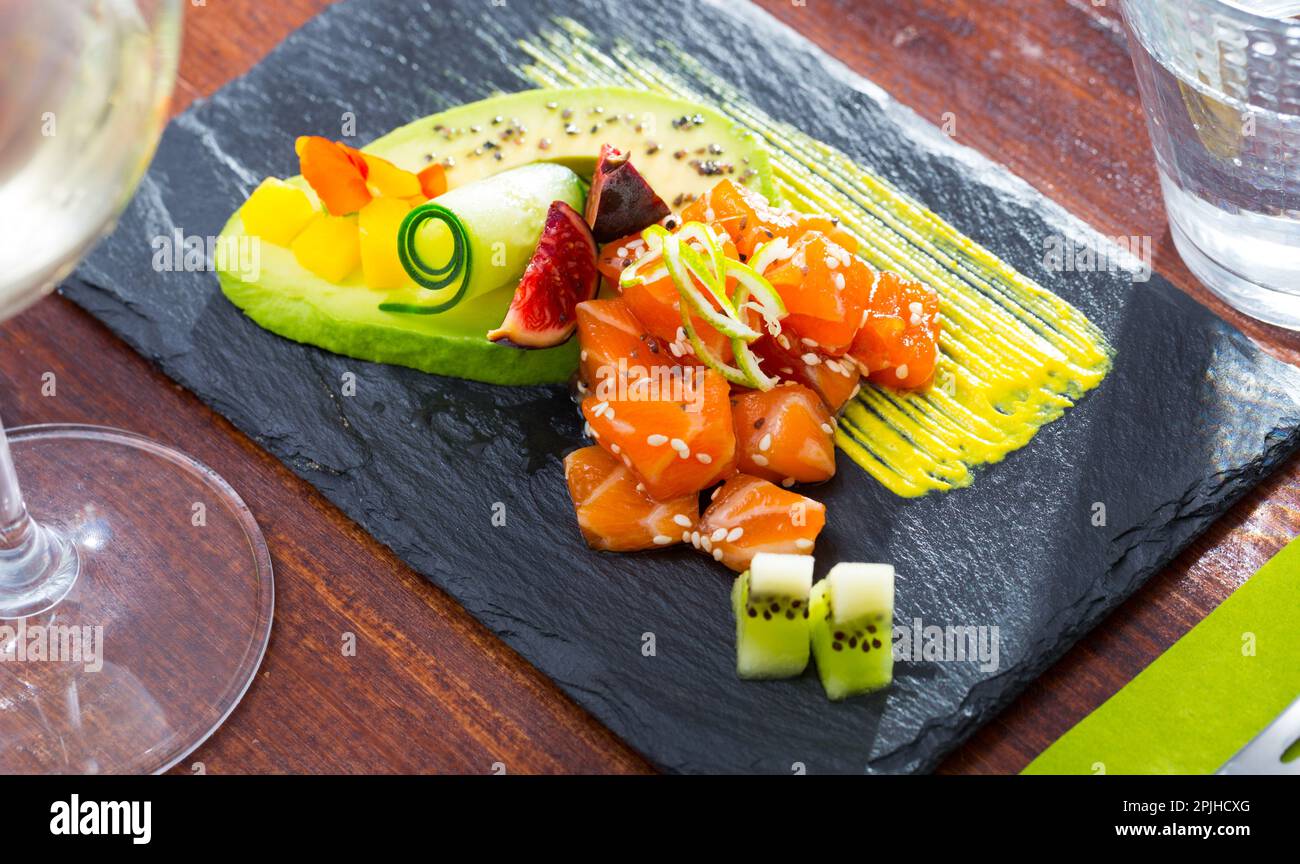 Tuna tartare with avocado and piquant mango sauce Stock Photo Alamy