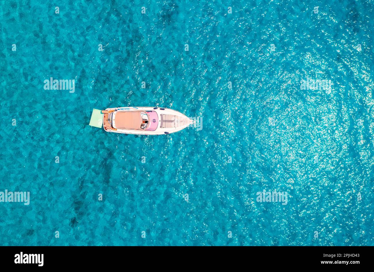 Aerial view of beautiful luxury yacht in blue sea in summer Stock Photo ...