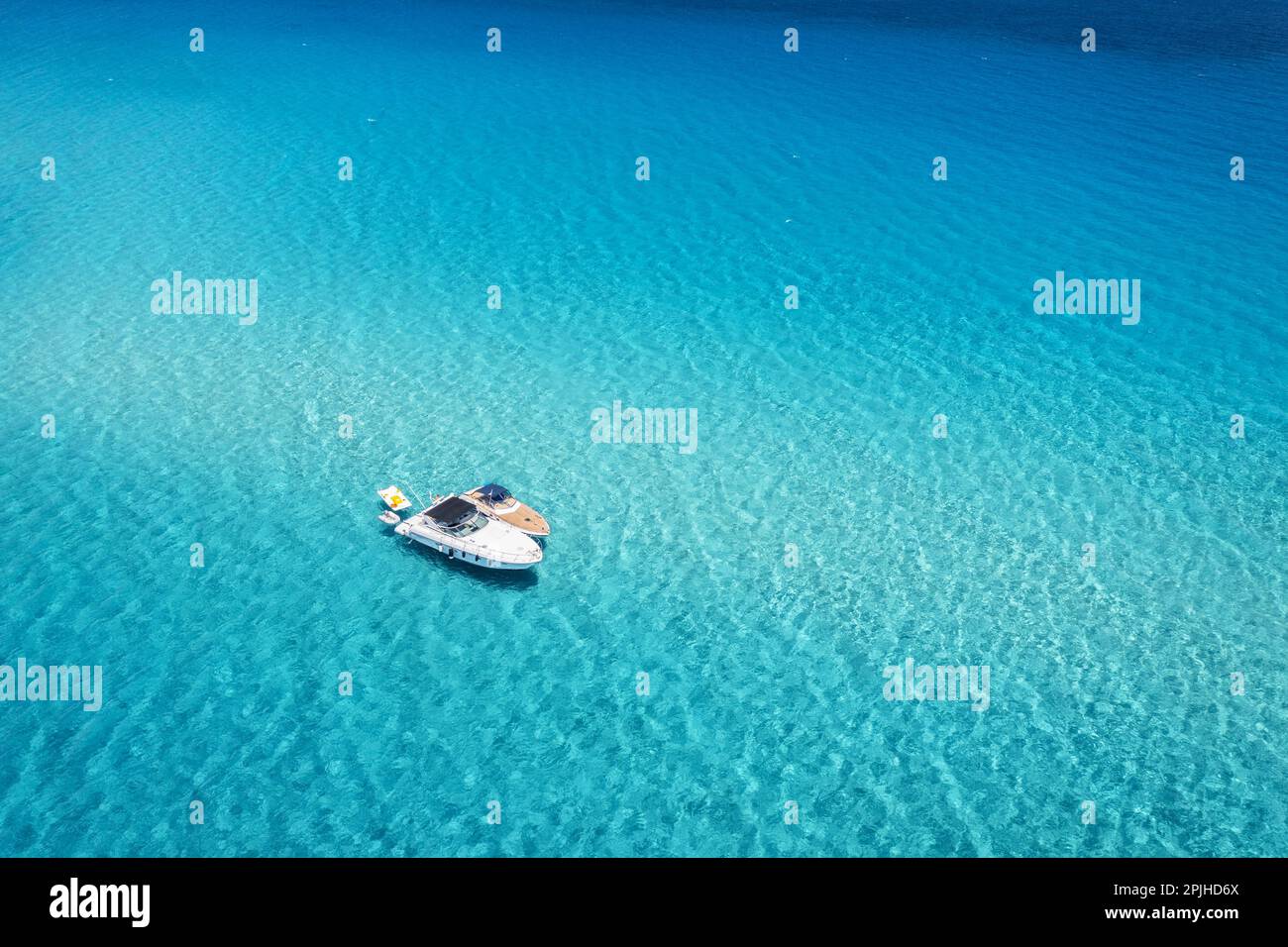 Aerial view of beautiful luxury yacht and boat in blue sea Stock Photo ...