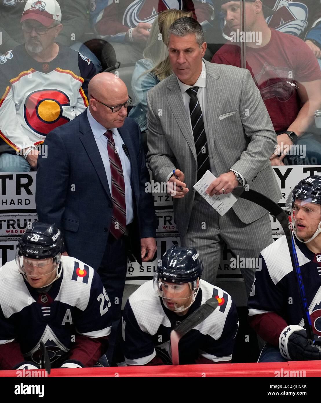Colorado Avalanche head coach Jared Bednar confers with Colorado
